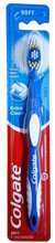 Load image into Gallery viewer, Blue Colgate toothbrush with soft bristles in a red and blue packaging
