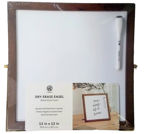 Dry erase easel with wooden frame and dry erase marker.