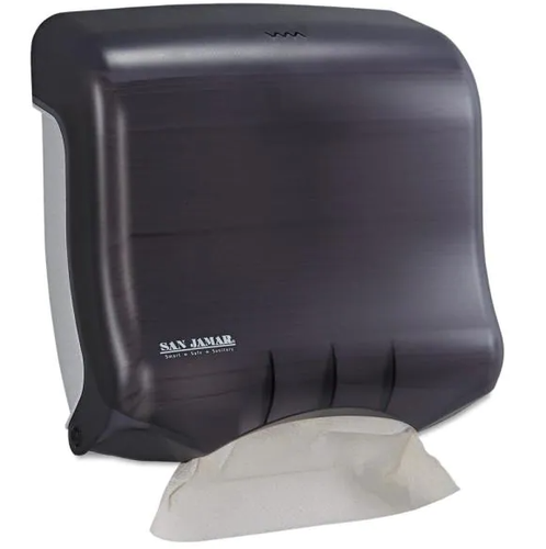 A black San Jamar Ultrafold Folded Paper Towel Dispenser with a paper towel hanging from it.